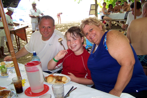 Dean Maletta, Joshua Bacarella and Beth Andersen enjoying lunch on the island